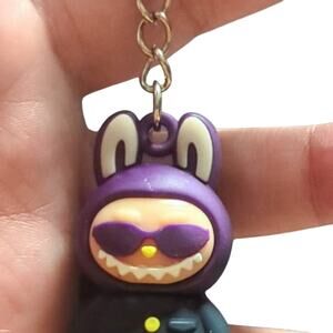 Purple monster rabbit doll keys purse, backpack boggs charm blue jacket no shoes